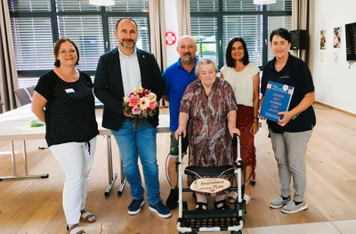Gruppennversammlung mit der Bürgermeisterin Elfriede Muhr und mehreren Anwesenden.
